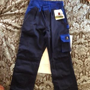 Heavy duty pants with spaces in knees for pads